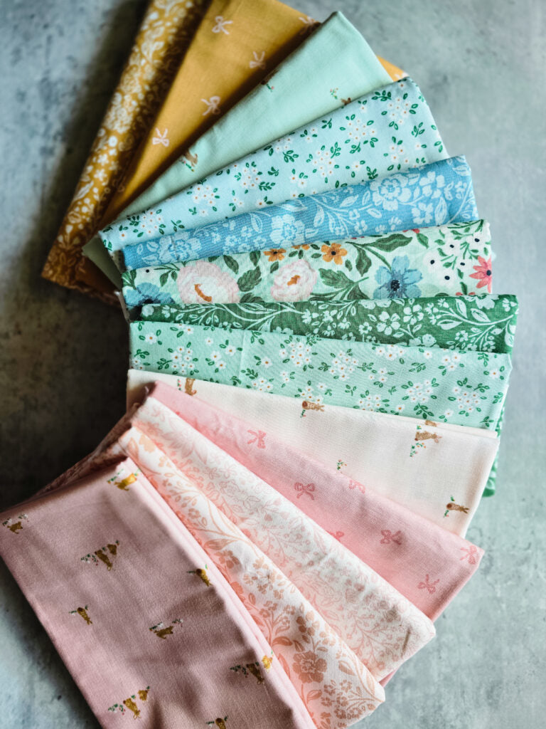 Sweet Cotton Tales | Features soft, pastel prints with florals and cute animals, perfect for quilting and kids’ projects.
